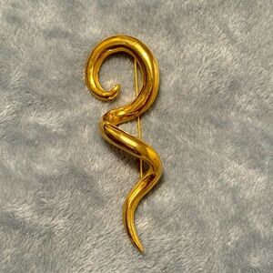 - Vintage Unstamped gold tone Polished Spiral/Swirl Brooch